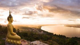 Pakse Buddhist Statue under sunset, Laos